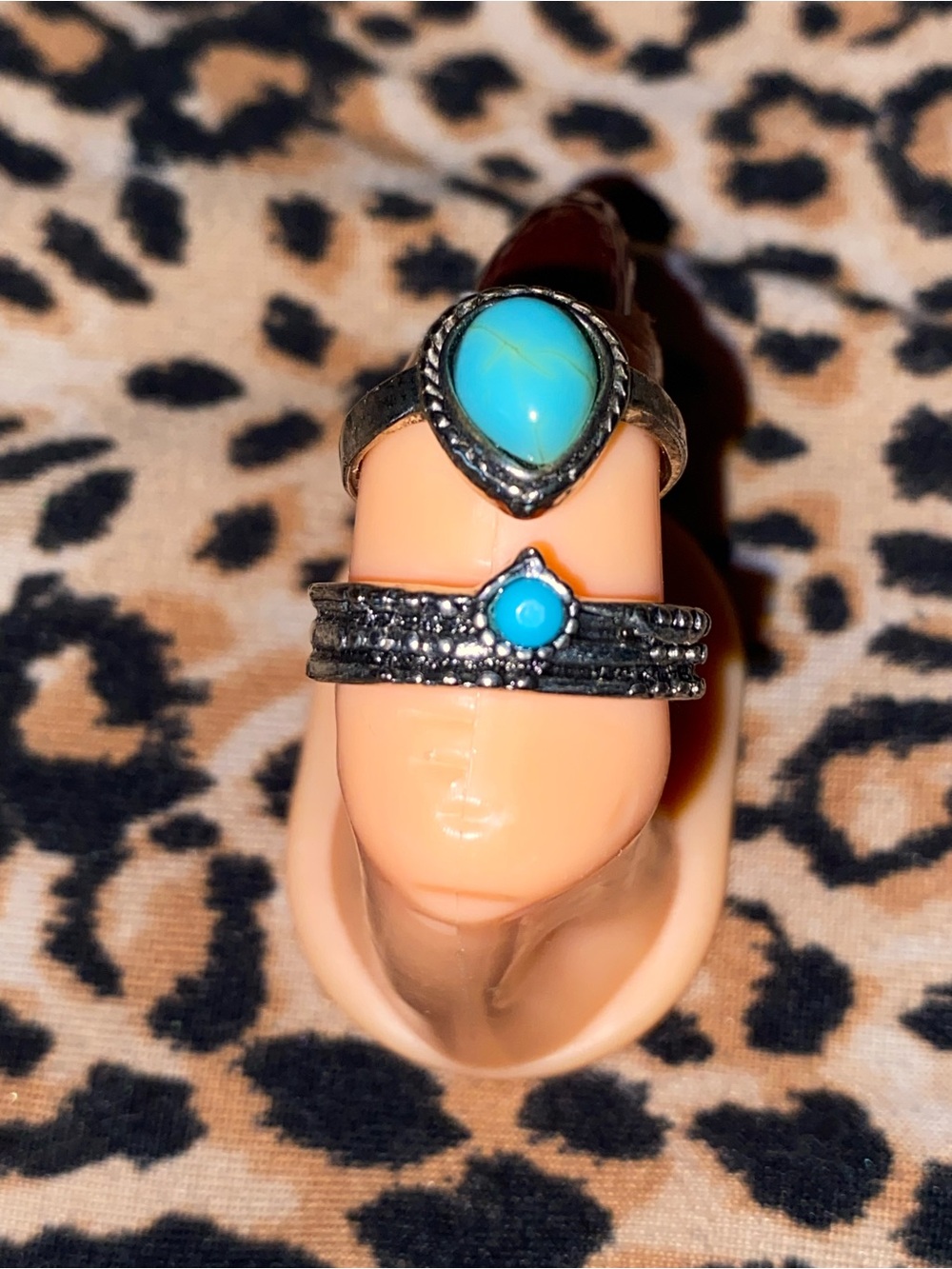 Turquoise marquise ring and a small turquoise little stone on a band ring